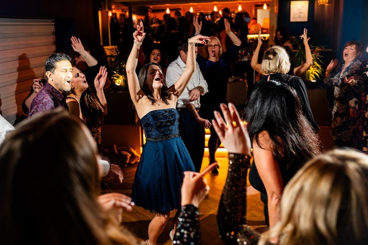 Corporate event DJ providing professional music entertainment for business events, conferences, and corporate parties.